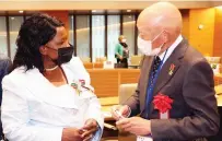  ?? ?? First Lady Dr Auxillia Mnangagwa interacts with Japanese Inter - national Cooperatio­n Agency ( JICA) expert in rice production Mr Tatsushi Tsuboi during the 1st Asia Pacific Africa Women’s Economic Exchange Summit in Tokyo, Japan on Monday