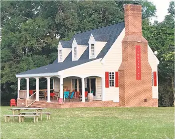  ?? MIKE HOLTZCLAW/STAFF ?? The tasting room at the SummerWind Vineyard in Smithfield is open four days a week during the summertime.