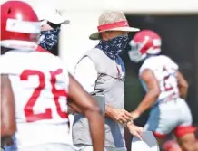  ?? ALABAMA PHOTO BY KENT GIDLEY ?? Alabama football coach Nick Saban has been wearing face coverings while heading up preseason practices in Tuscaloosa.