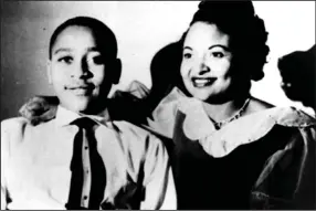  ?? (AP/Mamie Till Mobley Family, File) ?? This undated family handout photograph taken in Chicago shows Mamie Till Mobley and her son Emmett Till, whose lynching in 1955 became a catalyst for the civil rights movement.