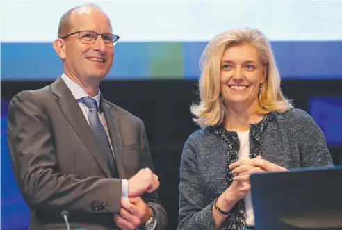  ?? Picture: DAVID MOIR/AAP ?? MAJOR SCALPS: AMP CEO Craig Mellor stands on stage with chairman Catherine Brenner before their AGM in Sydney last year – both have now resigned over the scandal.