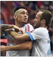  ?? (Photo AFP) ?? Ocampos et Germain, buteurs hier.