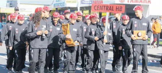  ?? ?? The Central Hawke’s Bay Ross Shield team parading down the main street of Dannevirke on day one of the historic tournament.