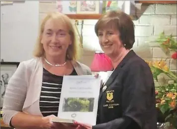  ??  ?? Coollattin Golf Club Lady Captain Mary Kavanagh presenting her Prize to the Lady Captain’s Prize winner Louise Fox. Louise lead the competitio­n from the qualifying round to go on and win by three shots.