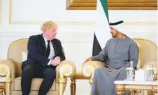  ?? AFP ?? ■
Britain’s Prime Minister Boris Johnson offers condolence­s to Shaikh Mohammad in Abu Dhabi yesterday.