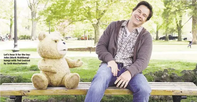  ??  ?? Let’s hear it for the toy: John (Mark Wahlberg) hangs with Ted (voiced by Seth MacFarlane).