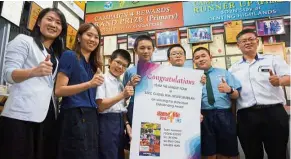  ??  ?? It’s thumbs-up all the way for this contest journey. From left: The school’s senior assistant (co-curriculum) Te Pein Ling, contest coordinato­r Lee, Ting Fong, Zi Feng, Jin Ying, Wen Huan and Wong.