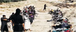  ?? WELAYAT SALAHUDDIN/ AFP/ GETTY IMAGES ?? An image on the jihadist website Welayat Salahuddin allegedly shows militants of the ISIL executing captured Iraqi security forces members at an unknown location in Salaheddin province.