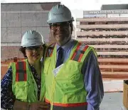  ??  ?? Ed Wolff, president of Beth Wolff Realtors Real Living, with his wife, Katy, got a preview of things to come at the Texas Children’s Hospital heart facility.
