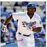  ?? JAYNE KAMINONCEA / GETTY IMAGES 2016 ?? Colorful Yasiel Puig, who hit 23home runs last year in 405 at-bats, should be a fan favorite, but where will he play? If the Reds keep him in right, that means moving Scott Schebler or giving Nick Senzel the job.