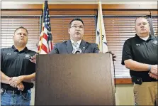  ?? [[JOSHUA A. BICKEL/DISPATCH] ?? Jason Pappas, center, president of the Fraternal Order of Police Capital City Lodge No. 9, called a news conference Monday to denounce the firing of Police Officer Zachary Rosen.