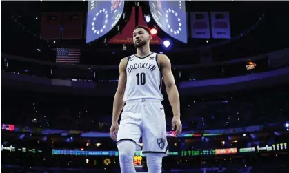  ?? ?? Ben Simmons walks the court during the first half of the Brooklyn Nets’ loss to the Philadelph­ia 76ers. Photograph: Matt Slocum/AP