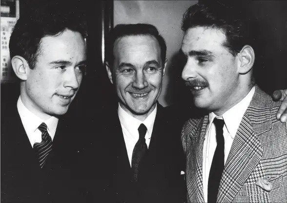  ??  ?? Scottish Convention founder John McCormick is flanked by Ian Hamilton (left) and Gavin Vernon, two of the students who ‘stole’ the stone