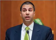  ?? AP FILE PHOTO ?? Federal Communicat­ions Commission Chairman Ajit Pai is following through on his pledge to repeal 2015 regulation­s designed to ensure that Internet service providers treat all online content and apps equally.