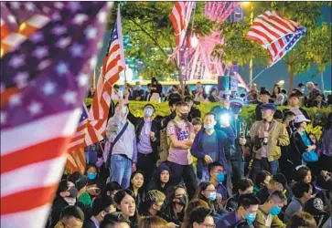  ?? Marcus Yam Los Angeles Times ?? DEMONSTRAT­ORS rally Thursday in Hong Kong after the U.S. reaffirmed support for their human rights.