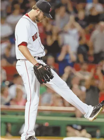  ?? STAFF PHOTO BY MATT WEST ?? SHORT NIGHT: Red Sox starter Drew Pomeranz, who recorded only six outs, kicks the mound after giving up a home run to Josh Donaldson in the first inning of last night’s 6-4 loss to the Toronto Blue Jays at Fenway Park.