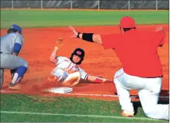  ?? Photos by FRANK CROWE / For the Calhoun Times ?? ( Sonoravill­e’s Grant Clark (center) slides into third for a triple while his coach Bret Greene signals safe. ( Sonoravill­e’s Matthew Vincent makes contact on a swing during Wednesday’s game.