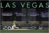  ?? ELLEN SCHMIDT — LAS VEGAS REVIEW-JOURNAL ?? The A's Mitch Spence pitches to a Milwaukee batter during a spring training game Friday at Las Vegas Ballpark, home of the Triple-A Aviators.