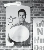  ?? ASSOCIATED PRESS ?? THIS DEC. 21, 2017, FILE PHOTO shows signs, including one featuring Papa John’s founder John Schnatter, at a Papa John’s pizza store in Quincy, Mass. Papa John’s plans to pull Schnatter’s image from marketing materials after reports he used a racial...