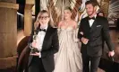  ?? Photograph: Ampas/ Rex/Shuttersto­ck ?? Playful … Florence Pugh, Andrew Garfield and Sarah Polley, winner of best adapted screenplay Oscar for Women Talking, leave the stage.