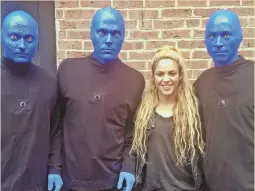  ?? COURTESY PHOTO FROM BLUE MAN GROUP ?? Singer Shakira poses with Blue Man Group at the Charles Playhouse recently.