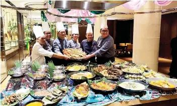  ?? ?? Hyatt Regency’s chefs showing some of the delicacies that will be available for the Ramadan buffet.