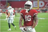  ??  ?? Cardinals wide receiver Trent Sherfield celebrates his touchdown catch from quarterbac­k Brett Hundley against the Raiders in the first half of a preseason game in Glendale.