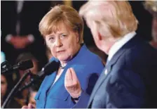  ?? EFE ?? Informe. El presidente estadounid­ense, Donald J. Trump, derecha, y la canciller alemana, Angela Merkel, izquierda, atienden una rueda de prensa conjunta durante su encuentro en Washington, DC.