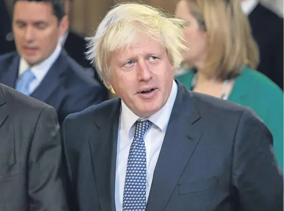  ?? Picture: Getty Images. ?? “Behave yourself, man!” Helen is unimpresse­d by Boris Johnson’s observatio­ns on women crying.
