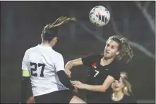  ?? Chris Torres/ The Signal ?? Vasquez’s Brooklyn Berger (27) and Santa Clarita Christian’s Kylah Bennett (7) go for the ball in the first half of a Heritage League match at Central Park in Saugus on Thursday.