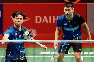  ??  ?? Optimistic: Nur Izzuddin Rumsani (left) sees the return of Rosman Razak as the assistant to Flandi Limpele as a big boost to the men’s doubles department.