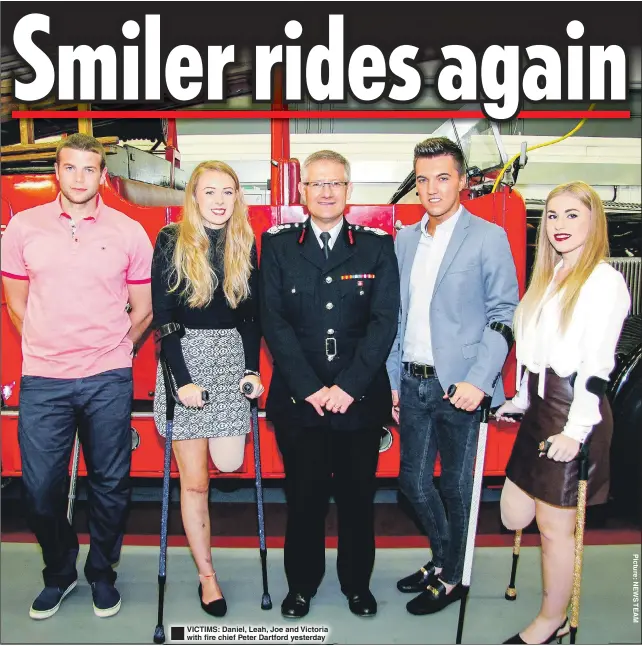  ??  ?? VICTIMS: Daniel, Leah, Joe and Victoria with fire chief Peter Dartford yesterday