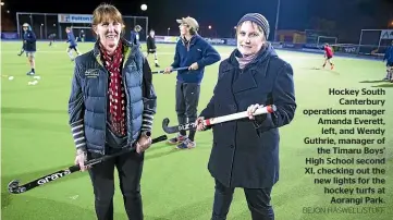  ?? BEJON HASWELL/STUFF ?? Hockey South Canterbury operations manager Amanda Everett, left, and Wendy Guthrie, manager of the Timaru Boys’ High School second XI, checking out the new lights for the hockey turfs at Aorangi Park.