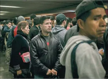  ?? Photograph­s by Meghan Dhaliwal For The Times ?? VICTOR CRUZ ORTEGA waits for a subway train in Mexico City to take him to work. He was deported from the U.S. in February after being arrested for running a red light, he said. His two children are still in the U.S.