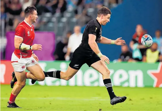  ?? Photo / Getty Images ?? Beauden Barrett was surprising­ly run down late in the test against Canada.