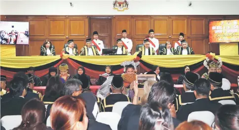  ??  ?? (From left) Yew, Malanjum, Zulkefli, Md Raus, Ahmad, Norchaya and Dean during the Open Court proceeding­s to mark the start of the Legal Year 2018 for Sabah and Sarawak.