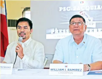  ?? REY NILLAMA ?? PSC-PACQUIAO CUP. Senator Manny Pacquiao answers questions while Philippine Sports Commission (PSC) chairman William “Butch” Ramirez listens during yesterday’s press conference for the PSC-Pacquiao Amateur Boxing Cup at the Rizal Memorial Sports...