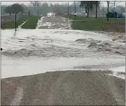  ?? PHOTO COURTESY OF JOHN PEDJAC ?? A number of roads in Denver Township were reportedly made impassable Wednesday after storms that brought torrential downpours and pea-sized hail made their way through late Wednesday morning.