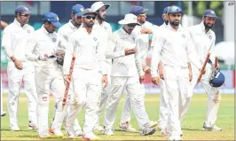  ?? AFP ?? Indian cricketers leave the ground led by captain Virat Kohli (C) after victory on Sunday