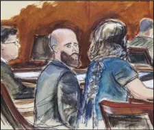  ?? ASSOCIATED PRESS ?? In this courtroom sketch Joshua Schulte (center) is seated at the defense table flanked by his attorneys during jury deliberati­ons on March 4 in New York.