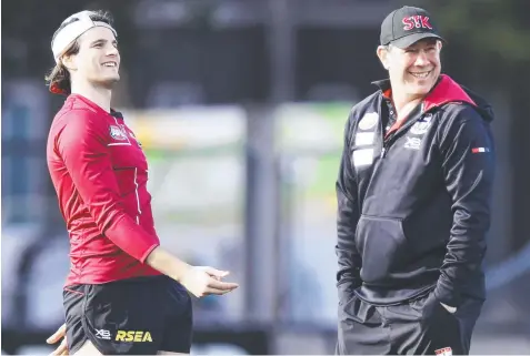  ?? Picture: MICHAEL DODGE/AAP ?? JOB TALKS: St Kilda interim coach Brett Ratten shares a laugh with Jack Steele during training yesterday.