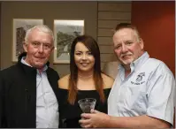  ?? Pic: ?? Top Ladies Driver Dee Benson receives her award from Robert Lyttle (COC Sligo Stages Rally) and Padraic Boylan (President of the Connacht Motor Club). James Burke.