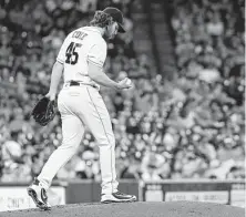  ?? Brett Coomer / Staff photograph­er ?? Astros righthande­r Gerrit Cole is left alone with his thoughts — and a new baseball — after giving up a home run in the second inning to Eloy Jimenez Wednesday night at Minute Maid Park.