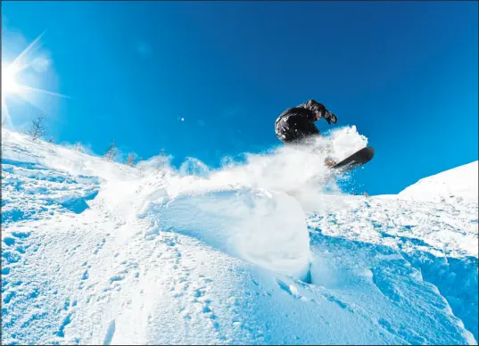  ?? Tribune News Service ?? An unidentifi­ed snowboarde­r like this person, in a Tribune News Service photo, got caught in an avalanche for the first time — and recounted every harrowing detail of the Big Cottonwood Canyon incident in a report to the Utah Avalanche Center on Jan. 18.