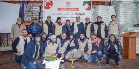  ??  ?? ANKARA: The Kuwaiti team in the Al-Rahma Internatio­nal pose for a group photo after arriving to Ankara, Turkey. — KUNA