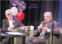  ?? JEFF SCHEID/ LAS VEGAS REVIEW-JOURNAL FOLLOW @JLSCHEID ?? Las Vegas Review-Journal gossip columnist Norm Clarke laughs as comedian Shecky Greene tells a story April 3 at The Smith Center. Clarke on Wednesday announced the end of his 17-year run at the newspaper.