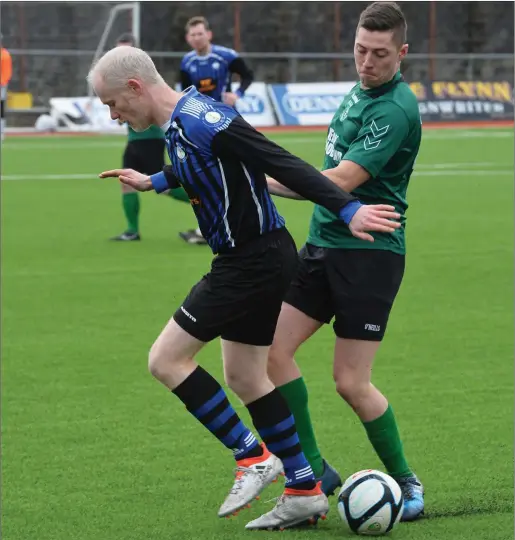  ??  ?? Kieran O’Mahoney, Fenit Samphires and Simon O’Shea, Inter Kenmare in action during their Denny Premier A clash in Mounthawk Park last weekend Photo by Domnick Walsh / Eye Focus
