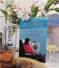  ??  ?? A copy of the book, and a bottle of Dingle Gin!