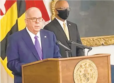  ?? BRYN STOLE/ BALTIMORE SUN ?? Maryland Gov. Larry Hogan announces an “economic relief” proposal at the State House on Monday.