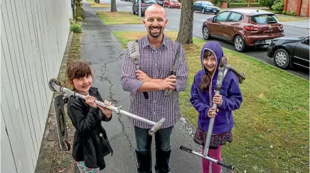  ??  ?? Ekant Veer, with his daughters, Micaiah, 8, left, and Keziah, 10, are hosting a barbecue for Neighbours’ Day Aotearoa on Saturday.
PHOTO: JOHN KIRK-ANDERSON/FAIRFAX NZ